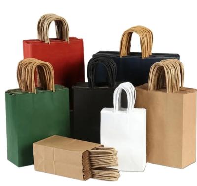 China Bio Degradable Customizable Kraft Paper Bag With Handle Gift Bag Eco Friendly Shopping Paper Bag for sale