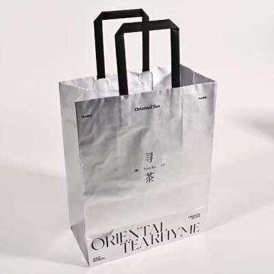 China Waterproof Tear Resistant Personalized Silver Color Paper Bag Paper Carrier Bag for sale