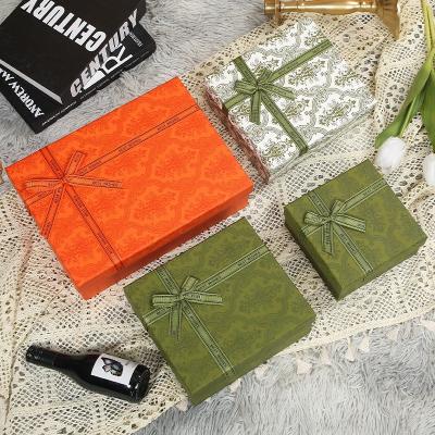 China Exquisite rigid gift box souvenir gift box customized color logo Perfume and spice flower box for sale