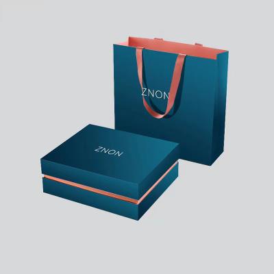 China Customized Luxury Magnetic Gift Box Packaging Folding Customized Logo Hard Cardboard Clothing Gift Packaging Box for sale