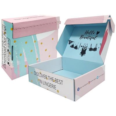 China Caja de embalaje de envío de cartón plegable personalizado con cremallera simple Caja de papel rosa única en venta