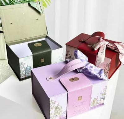 China Caja de regalo rígida de cartón reciclado ecológico personalizado Diseño plegable colorido Cierre magnético Adecuado para zapatos y envases de ropa en venta