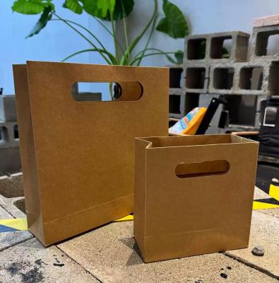 China High-grade kraft paper bag thickened hole special handbag gift bag square gift packaging bag storage custom logo for sale