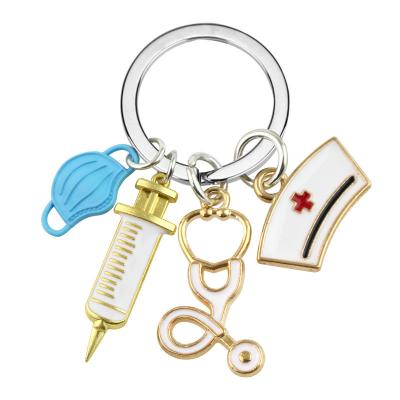 China Hot Pendant Key Chain Alloy Doctor Nurse Hat Maskes Key Ring Injector Syringe Cardiogram Stethoscope for sale