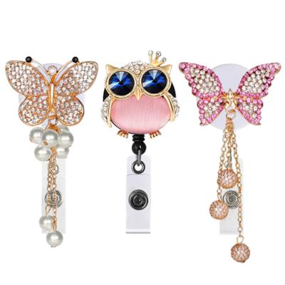 China Popular Wholesale Retractable Medical Doctor ID Badge Holder Crystal Owl Butterfly Badge Reel Felt for Women Doctor Gifts for sale