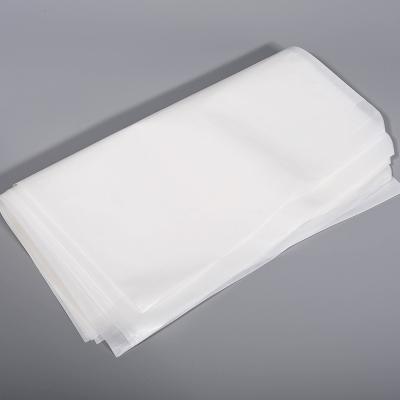 China Bio-degradable Wholesale eco friendly kraft clothing t shirt shipping packaging bag custom recycled transparent wax paper mailers envelope for sale