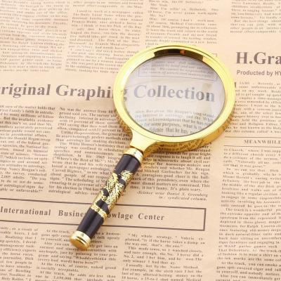 China Zoom In Portable Handheld Magnifying Glass For Newspaper Book Reading Hand 10x Magnifier Lens Price Wooden Hand Magnifier for sale