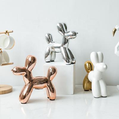 China Nordic Handcrafted Ceramic Dog Shaped Phone Booth Golden Balloon Dog Money Bank Piggy Bank For Family for sale