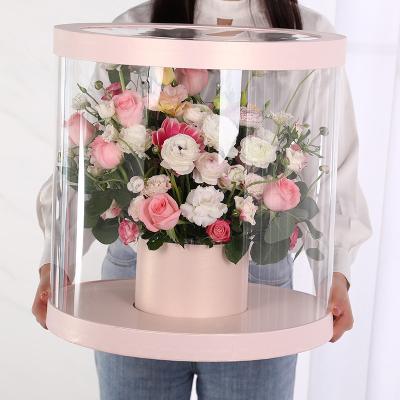 China Recycled Materials Giant Round Flower Box Korean Bucket Holding Flower Arrangement Transparent Paper Box PVC Window Gift Flower Box for sale