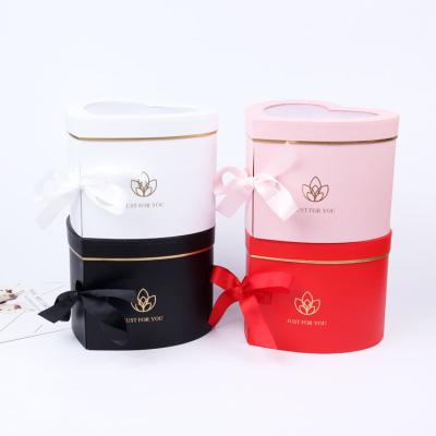 China Recyclable Double Stain PVC Window Flower Packaging Box Flower Soap Flower Heart Shaped Rotating Gift Box For Valentine's Day for sale