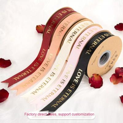 China Luster Factory Direct Sales 2.5cm Gilding Flowers Packaging Ribbon Printing Ribbon Cake Wrapping Flower Tie Bouquet Floral Ribbon for sale