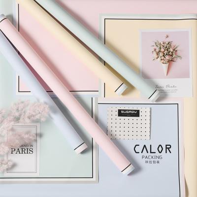 China Waterproof factory for wholesale Korean memory picture frame flower wrapping paper raw material bouquet frosted paper for sale