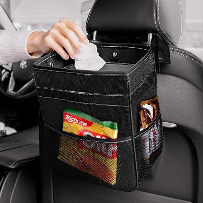 China Multifunctional Waterproof Car Organizer Bag Car Storage Box Vehicle Headrest Hanging Car Waterproof Trash Bin for sale