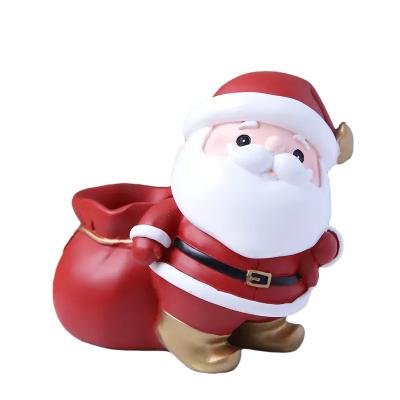 China Creative Europe Santa Claus Silver Pot Apple Pen Holder Storage Resin Bedroom Living Room Table Decoration Christmas Gifts for sale