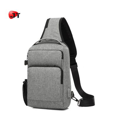 China High Quality Small Sling Crossbody Mini Shoulder Chest Bag For Men And Women with USB port for sale