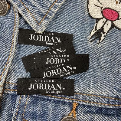 China Sustainable Custom Fashion Apparel Woven Label End Fold Main Garment Woven Label With Brand Logo for sale