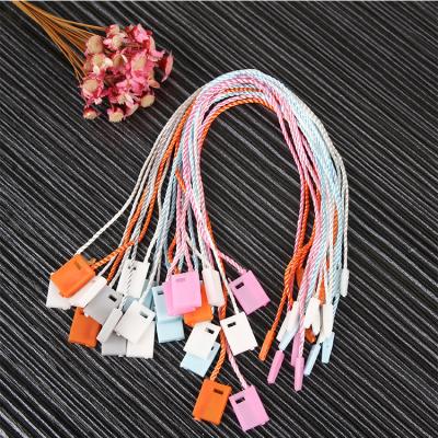 China Durable Plastic Loop String Seal Tag For Luggage Hang Tag for sale