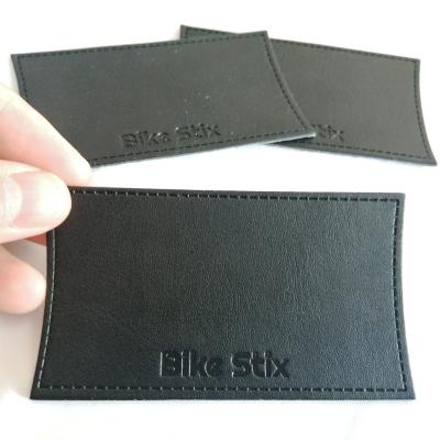 China Viable Custom Leather Logo Logo Embossed Leather Patches for Handbag, OEM Leather Labels for Hat/Apparel for sale