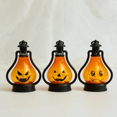 China Shopping Malls Halloween Decorations Kids Wear Plastic Pumpkin Lights Lanterns Decoration for Kindergarten Bar Horror Props for sale