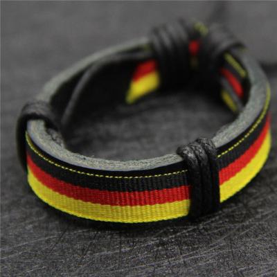 China CLASSIC National Flag Embroider Leather Wristband For Soccer Basketball Fans for sale