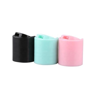 China Non Spill Cosmetic Packaging Lotion Cover Press Plastic Disc Top Cap for sale