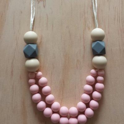 China 100%food grade 2020 Silicone Teether Baby Statement Teether Necklace Baby Chewable Silicone Beads Wooden Teether Bracelet Teether Ring Rattles Toys for sale