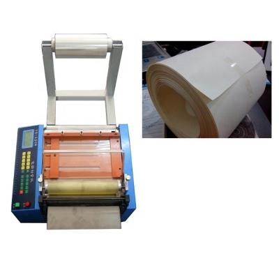 China Automatic CLOTHING Sticker Roll Cutting Machine For Factory for sale