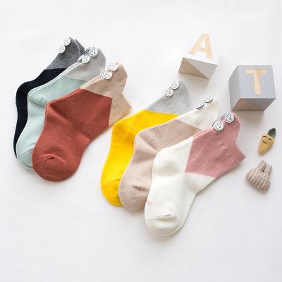 China Autumn Winter Funny Kids Antibacterial Cotton Socks 3-9 Years Kids Socks Girl Custom Anti Slip Button Socks for sale