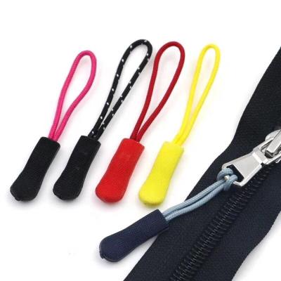 China Wholesale High Quality Nickel Free PVC Puller Customized Logo Plastic Zipper Pullers Zipper Head For Garment And Bags for sale