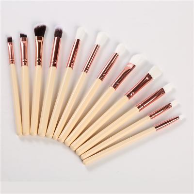 China Angular Blush 12Pcs Makeup Brush Set Good Quality Custom Logo Wood Handle Cosmetic Tools For Woman for sale