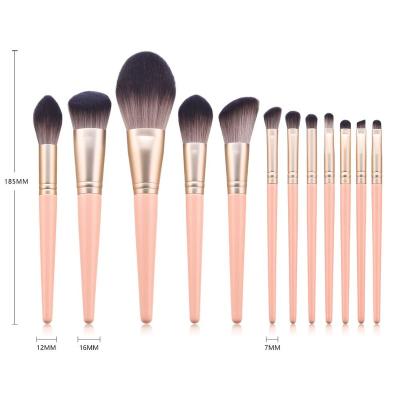 China Angular Blush High Quality Personalized Luxury Light Pink Wooden Handle Set Makeup Brushes for sale