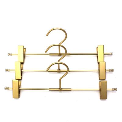 China Space Saving Luxury Metal Trouser Aluminum Pants Hoses Gold Metal Clip Hangers for sale