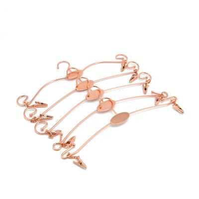 China Eco-friendly Material Custom Logo Rose Gold Copper Metal Clip Bikini Hangers For Display for sale