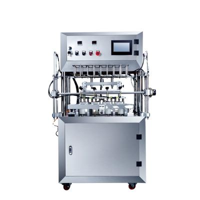 China Food Gold Aluminum Foil Yogurt Cup Sealing Machine 4 Cavities for sale