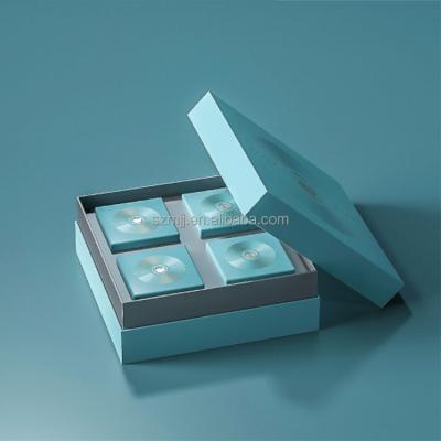 China Recyclable Custom Luxury Rigid Top And Lid Cardboard Perfume Packaging Gift Set Box With Blue Filling Slotted EVA Sponge for sale