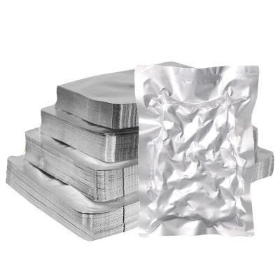 China Silver Heat Seal Three Layers Laminated Airtight Mylar Vacuum Aluminum Foil Vacuum Bags for sale