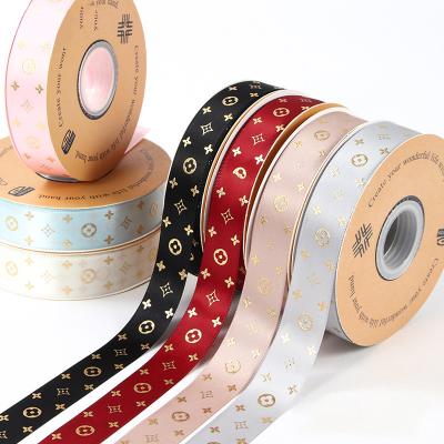 中国 Silk Screen Printed Polyester Satin Ribbon Other Packaging Products With Gold Foil Stamping Printing 販売のため