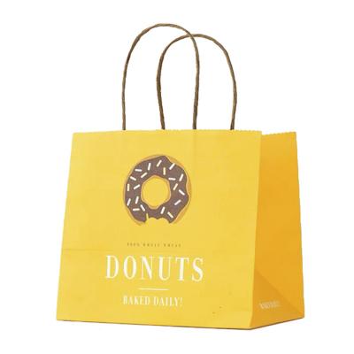 China Printed Recycled Kraft Paper Bag Custom Printed Packaging Shopping Paper Bag for sale