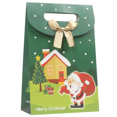 China Printed Gift Packing Paper Bag Green Fancy Boutique Ribbon Christmas Shopping Paper Bag zu verkaufen