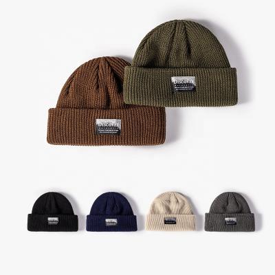 China Custom Sunborry JOINT New York Label Fashion Mens Womens Acrylic Hot Patch Beanie Hat Autumn Winter Knitted Skullcap Blank for sale