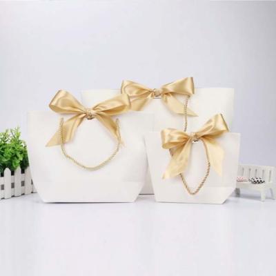 China Recycled Materials Customize Design Kraft Paper Bag Printing Paper Bag Fancy Shopping Fashion for sale