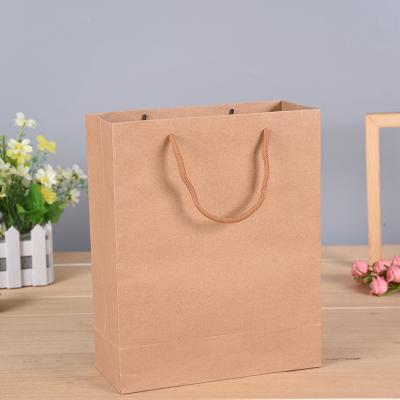 China Factory wholesale handmade cheap logo printing custom kraft paper bag with ribbon handle for sale