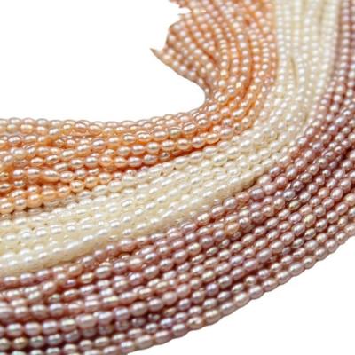 China 2.8-3.2mm Trendy Natural Freshwater Pearl Rice Strand Loose Pearl 36-38cm Length White/Pink/Purple Colors for sale