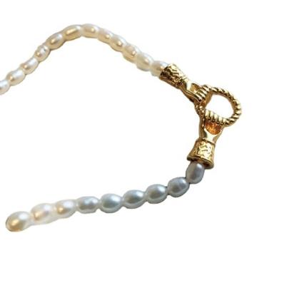 China Vintage Gold Casual / Sporty Hands Design Charm Pendant Necklace with Natural Freshwater Rice Pearl Necklace for sale