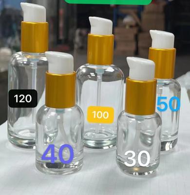 China Recyclable Transparent Glass Empty Bottles Serum Crystal Essential Oil Bottle for sale