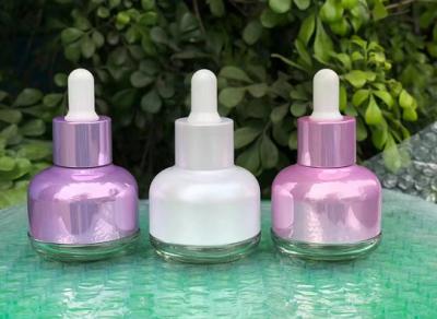 China 30ml Glass Makeup Containers Skincare Packaging Rose Gold White Dropper Bottle for sale