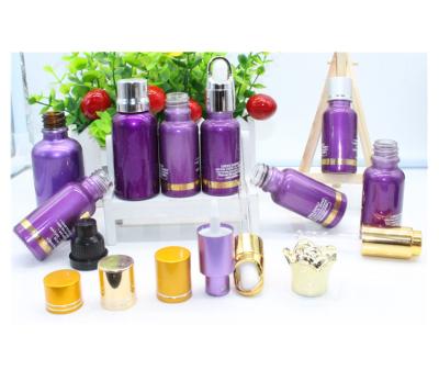 China 50Ml Purple Glass Cosmetic Oil Bottles For Essential Oil Packaging for sale