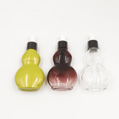 China Flat Gourd Aromatherapy Glass Bottles Essential Oil Sample Bottles 10ml for sale