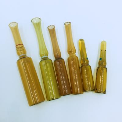 China 2ml Amber Empty Serum Bottle Glass Ampule Vial For Make Up Packing for sale