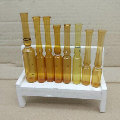 China OEM Empty Serum Bottle Glass Transparent European Standard Ampoule Bottle for sale